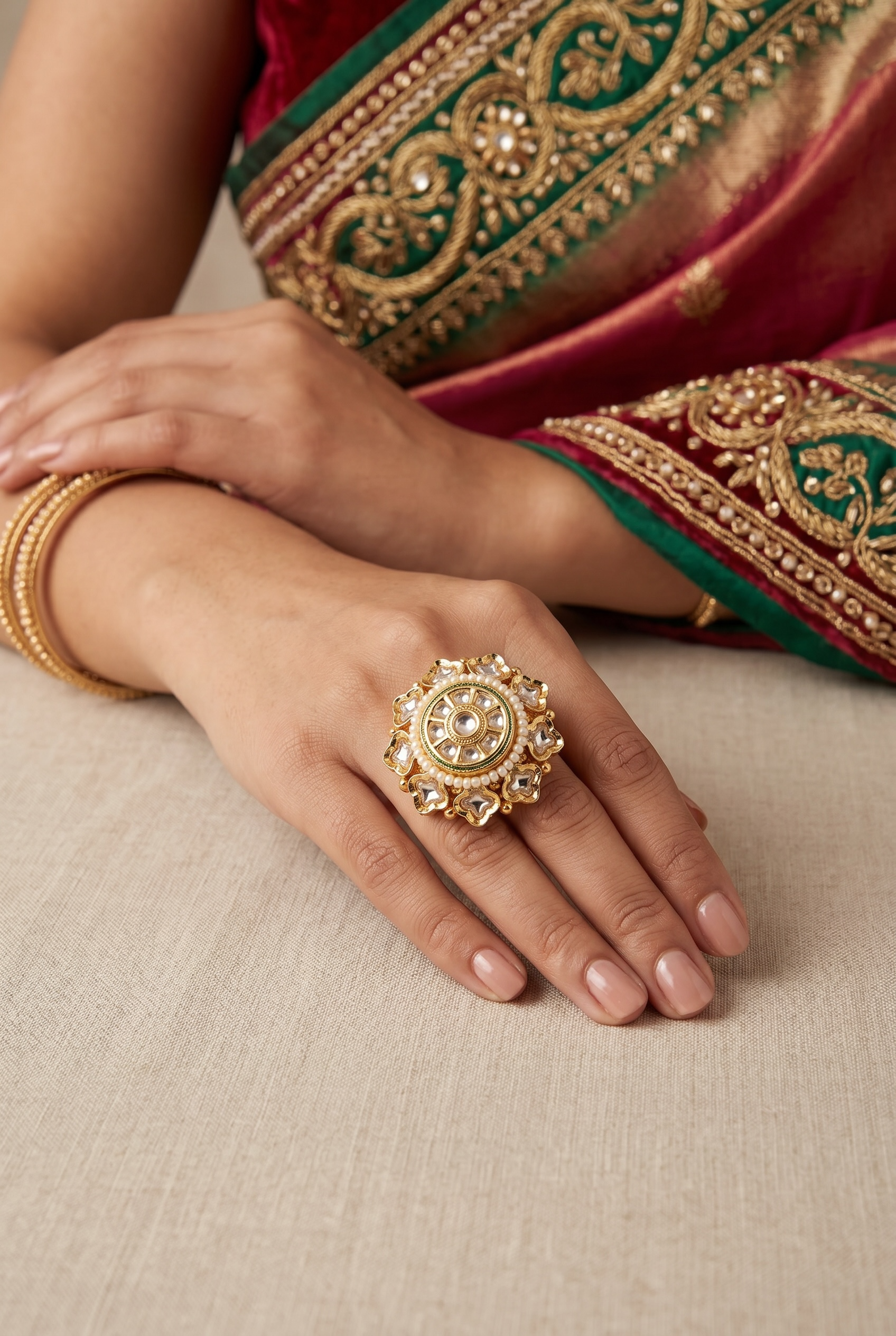 Royal Kundan ring with pearl string.